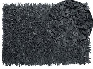 Fekete bőr hosszú szálú szőnyeg 140 x 200 cm MUT
