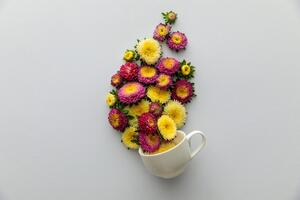 Fotótapéta virágokkal teli csésze
