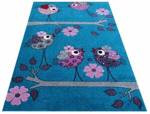 Kék szőnyeg lila madár motívummal Szélesség: 100 cm | Hossz: 200 cm