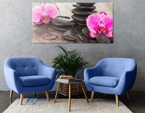 Kép orchidea és zen kövek fa háttéren