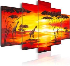 Vászonkép - Zsiráfok a háttérben a naplemente