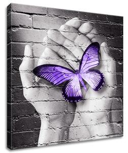 Gario Vászonkép Lila pillangó tenyéren Méret: 60 x 40 cm