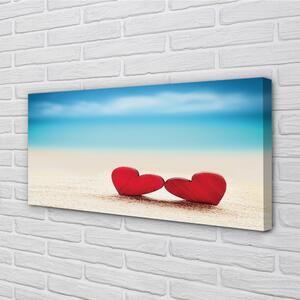 Canvas képek Szív vörös homok tenger 100x50 cm