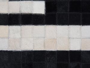 Fekete és fehér bőrszőnyeg 80 x 150 cm BOLU