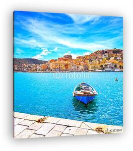 Fából készült kis csónak Porto Santo Stefano tengerpartján. Arge (vászonkép)
