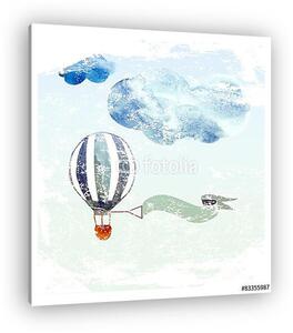Csíkos hőlégballon a felhőhatáron (vászonkép)