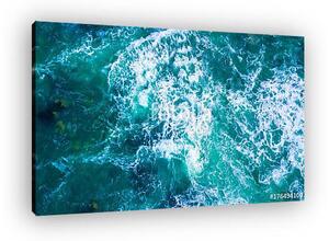 Drone view of waves hitting sea shore (vászonkép)