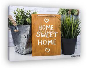 Wooden board with text home sweet home (vászonkép)