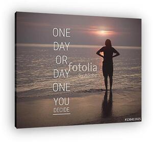 Inspirational quote on silhouette of woman walking on the beach (vászonkép)