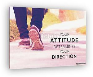 Inspirational quote on blurred road and pair of legs background (vászonkép)
