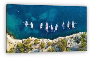 Yachts at the sea in France. Aerial view of luxury floating boat on transparent turquoise water at sunny day. Summer seascape fr (vászonkép)