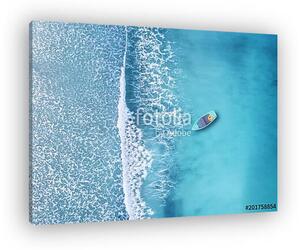 Wave and boat on the beach as a background. Beautiful natural background at the summer time from air (vászonkép)