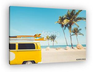 Vintage car parked on the tropical beach (seaside) with a surfboard on the roof - Leisure trip in the summer. retro color effect (vászonkép)