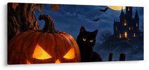 Kép - Fekete macska egy világító halloweeni tök mellett (120x50 cm)