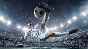Művészeti fotózás Soccer player kicking ball in stadium, Dmytro Aksonov, (40 x 22.5 cm)