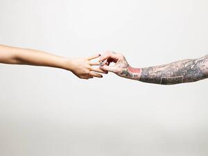 Fotográfia Man with tattooed arm placing ring, ballyscanlon, (40 x 30 cm)