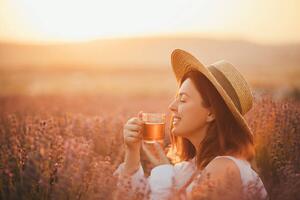 Művészeti fotózás Young happy woman drinking herbal tea,, Polina Lebed, (40 x 26.7 cm)