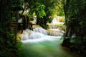 Fotográfia Beautiful view of Deep forest waterfall landscape., Chanet Wichajutakul