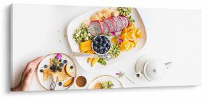 Tányérok gyümölcsökkel az asztalon képe (120x50 cm)