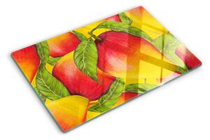 Edzett üveg vágódeszka Paprika zöld levelek hátterében