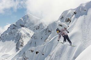 Nem szőtt fotótapéta snowboardos a hegyekben 375 x 250 cm