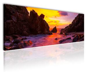 120x50 cm Sárga naplemente a sziklák között vászonkép