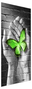 Fotótapéta ajtóra - Zöld pillangó a tenyérben (95x205cm)