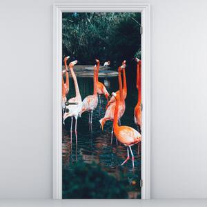 Fotótapéta ajtóra - Flamingócsorda (95x205cm)