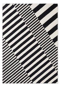 Fekete-fehér kézi szövésű gyapjú szőnyeg 160x230 cm Stryve Flux – Elle Decoration