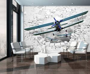 Fotótapéta - A repülőgép kirepül a falból 3D-ben (152,5x104 cm)