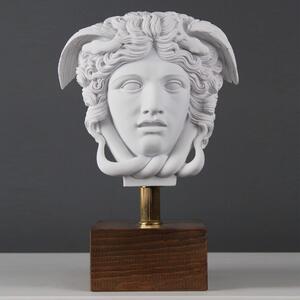 Medusa fej szobor fa talpazaton márvány luxus lakberendezés
