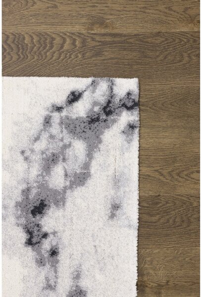 Krémszínű gyapjú szőnyeg 133x180 cm Volakas – Agnella