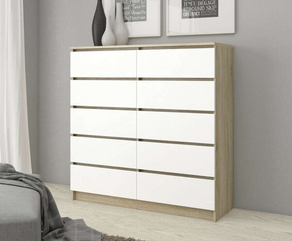 Akord Komód K140 10SZ Diófa Sonoma/Borító Fehér 138x121x40 cm 10 Fiókos Mat Bef. Szekrény