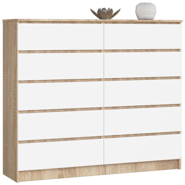 Akord Komód K140 10SZ Diófa Sonoma/Borító Fehér 138x121x40 cm 10 Fiókos Mat Bef. Szekrény
