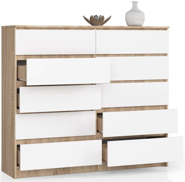 Akord Komód K140 10SZ Diófa Sonoma/Borító Fehér 138x121x40 cm 10 Fiókos Mat Bef. Szekrény