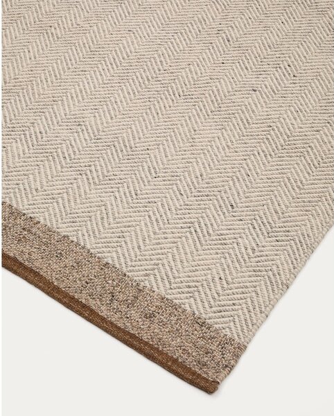 Bézs kétoldalas kézi szövésű gyapjú szőnyeg 160x230 cm Nifelia – Kave Home