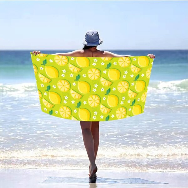 Strandkészlet LEMONS – Fürdőlepedő 100×180 cm és poncsó 80×145 cm, zöld