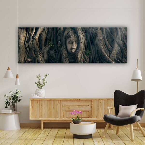 70x40 cm - Ősi Buddha arc a fák között vászonkép