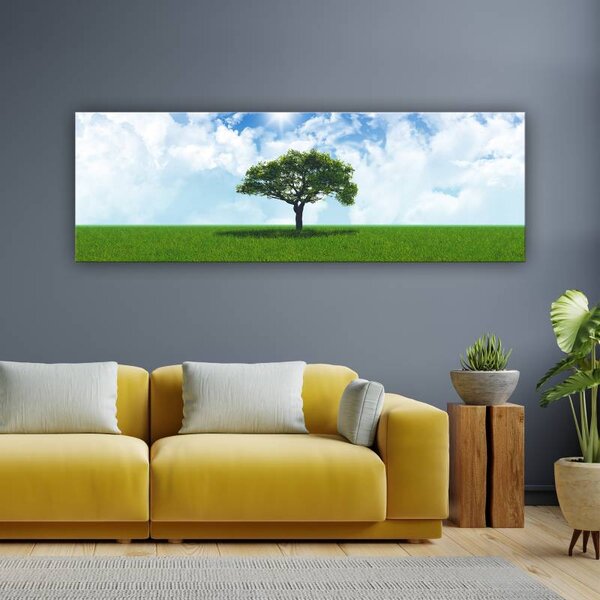 70x40 cm - Zöld fa a réten a kék ég alatt vászonkép