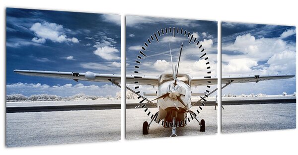Egy motoros repülőgép képe (órával) (90x30 cm)
