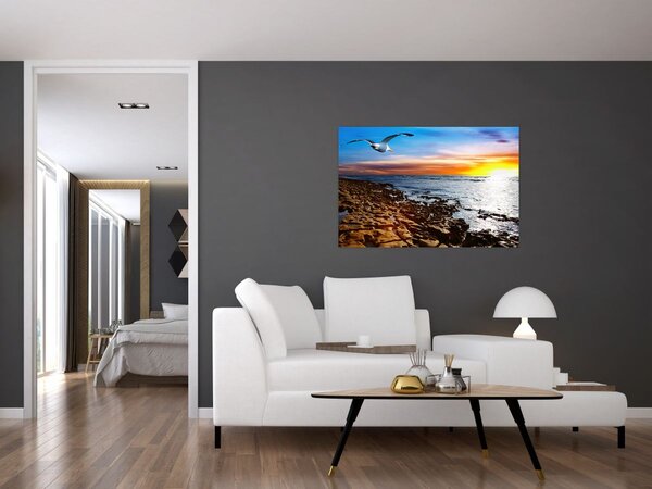 Kép - Sirály repül a tengerpart felett (90x60 cm)