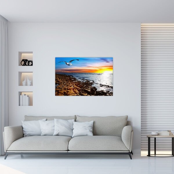 Kép - Sirály repül a tengerpart felett (90x60 cm)