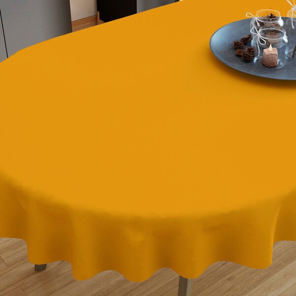 Goldea pamut asztalterítő - mustárszínű - ovális 80 x 140 cm