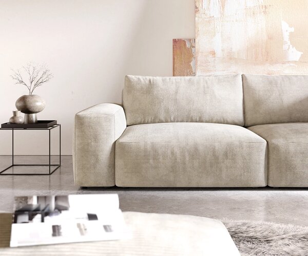 DELIFE Nagy kanapé Lanzo XL 270x130 cm kordbársony bézs puffal