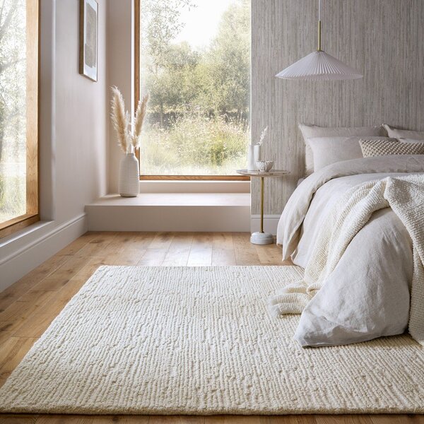 Elefántcsont színű kézi szövésű gyapjú szőnyeg 120x170 cm Harris Boucle – Flair Rugs