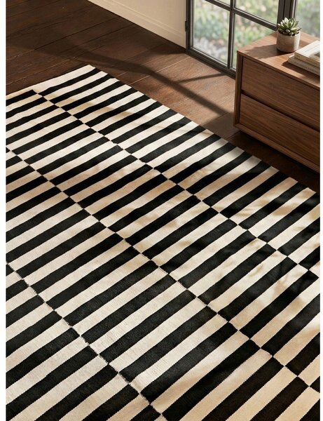 Fekete-fehér kétoldalas kézi szövésű gyapjú szőnyeg 200x300 cm Donna – Hanse Home