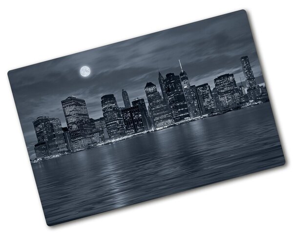 Üveg vágódeszka fényképpel New york építészet éjjel