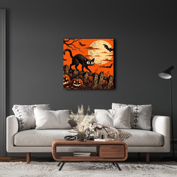 Kép halloweeni macska tökök között