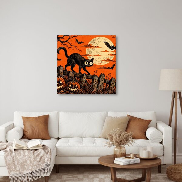 Kép halloweeni macska tökök között