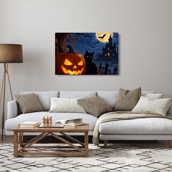 Kép - Fekete macska egy világító halloweeni tök mellett (90x60 cm)